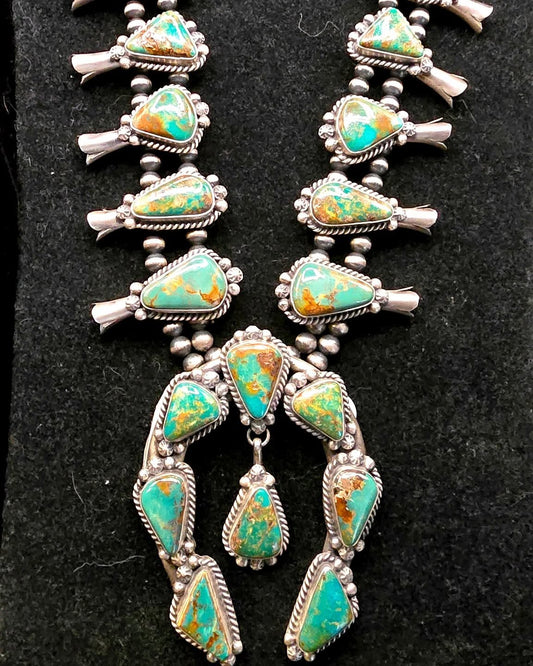 Augustin Largo Squash Blossom Necklace.