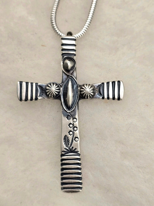Silver Cross by Mary Cayatineto